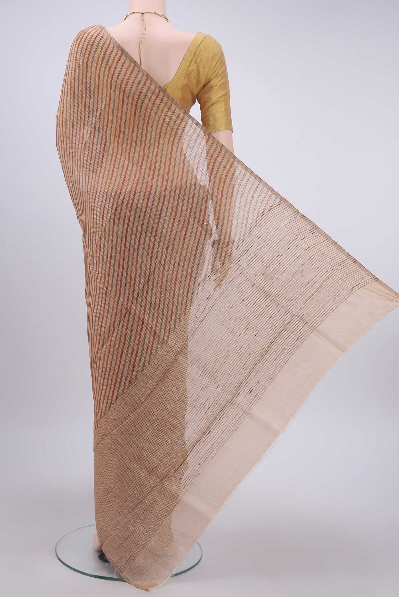 Flat view of Peach Tussar Silk Saree with Printed design on the body and Printed Border
