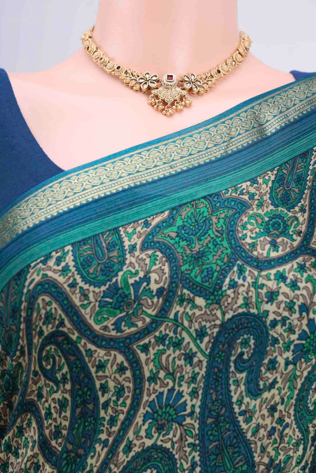 Border image of Cream Mysore Crepe Saree with Floral Print on the body and Zari Border