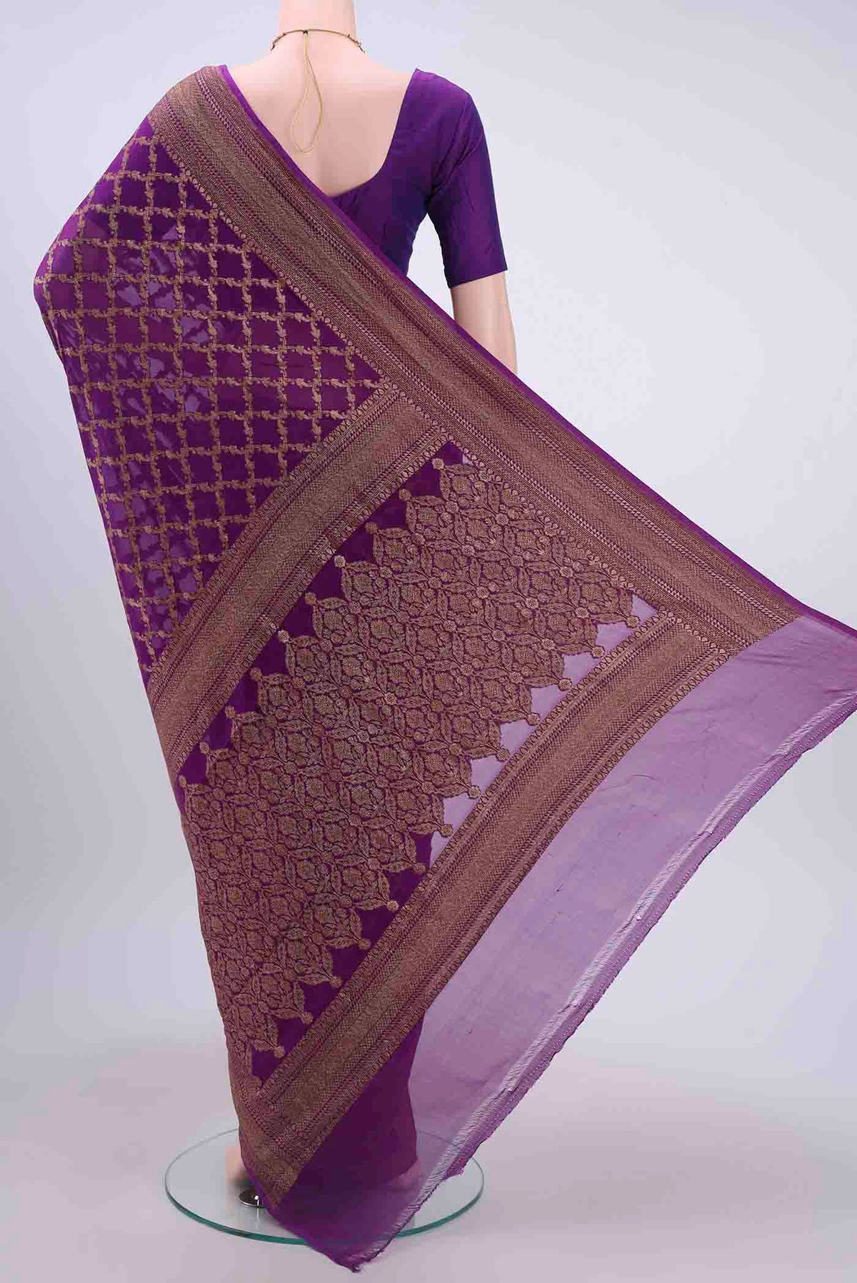 Flat view of Purple Banarasi Georgette Saree with Zari Brocade on the body and Zari Border