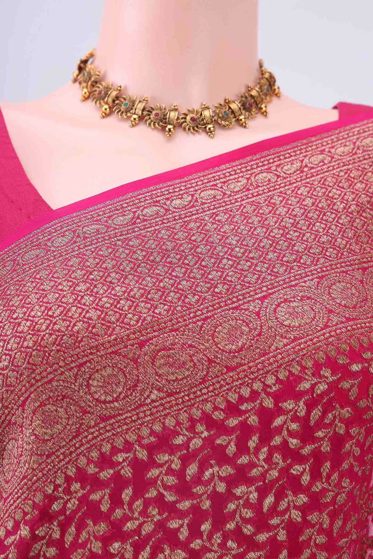 Border image of Dark Pink Banarasi Georgette Saree with Zari Brocade on the body and Zari Border