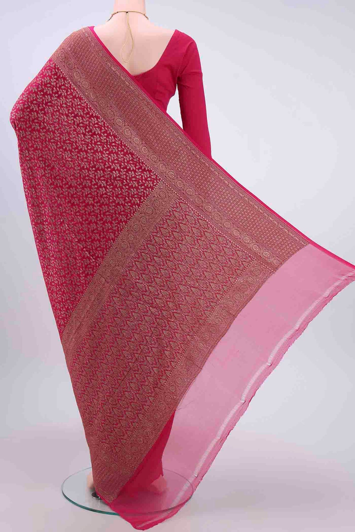 Flat view of Dark Pink Banarasi Georgette Saree with Zari Brocade on the body and Zari Border