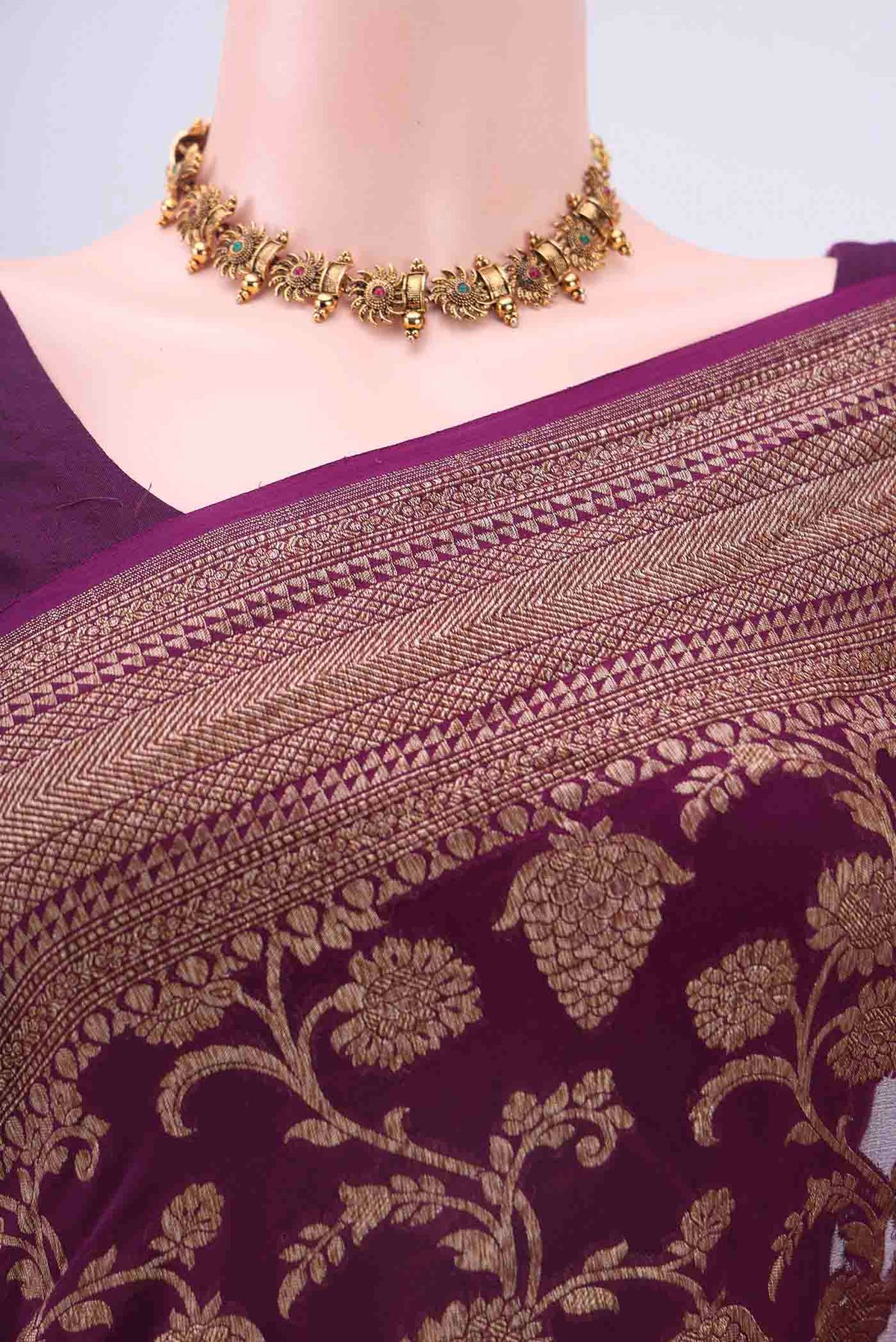 Border image of Burgundy Banarasi Georgette Saree with Zari Brocade on the body and Zari Border