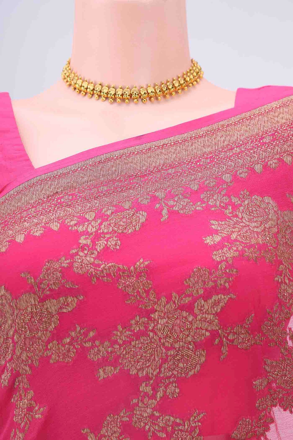Border image of Dark Pink Banarasi Georgette Saree with Zari Brocade on the body and Zari Border