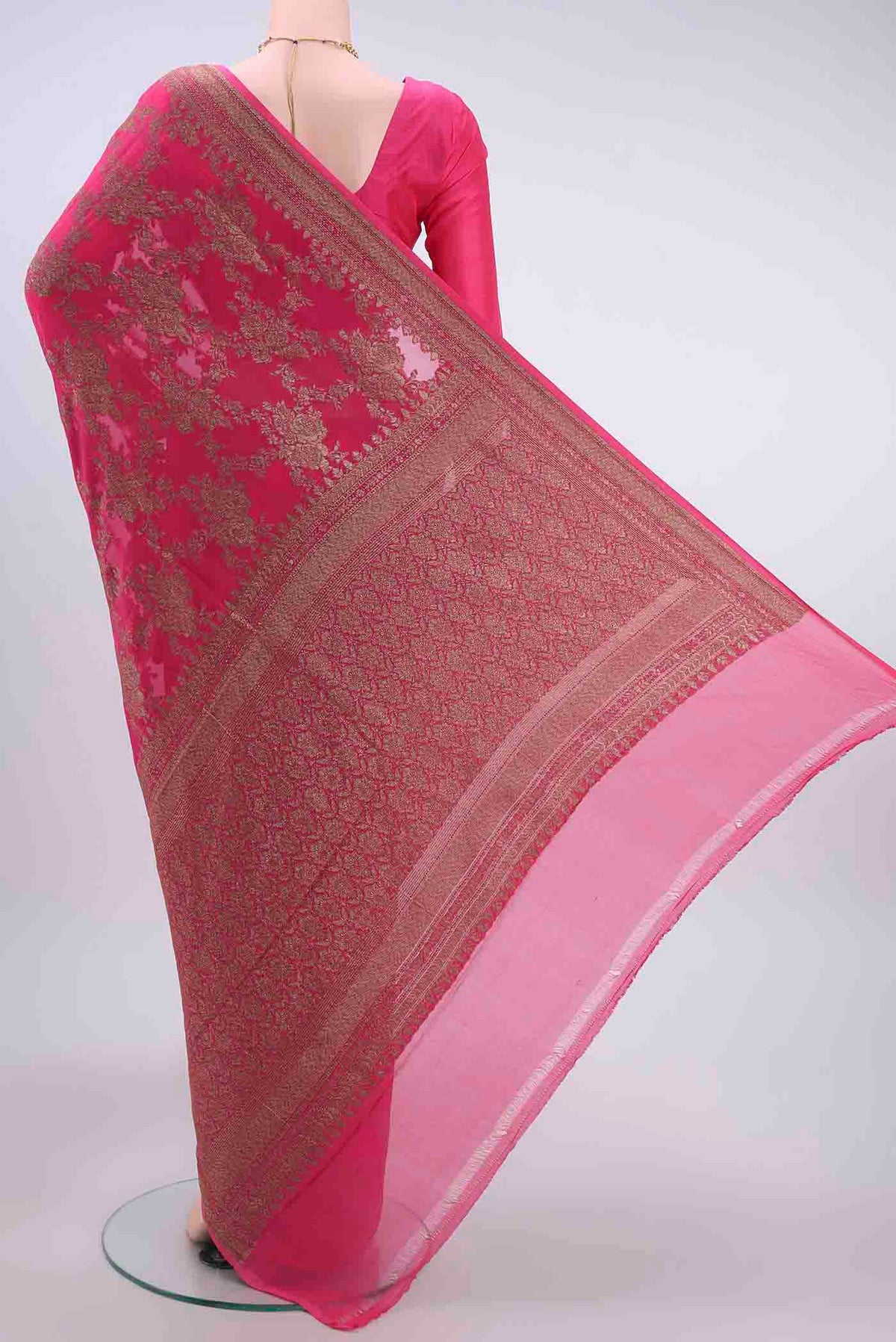 Flat view of Dark Pink Banarasi Georgette Saree with Zari Brocade on the body and Zari Border