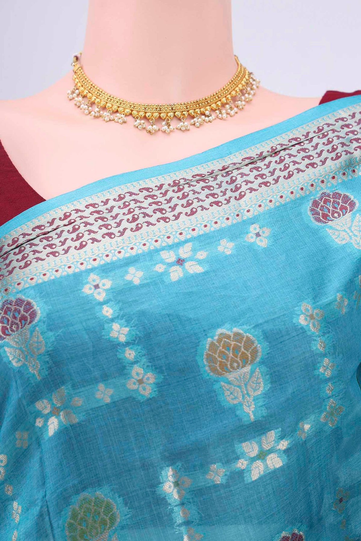 Border image of Blue Banarasi Raw Silk Saree with Zari And Thread Butta on the body and Zari Border