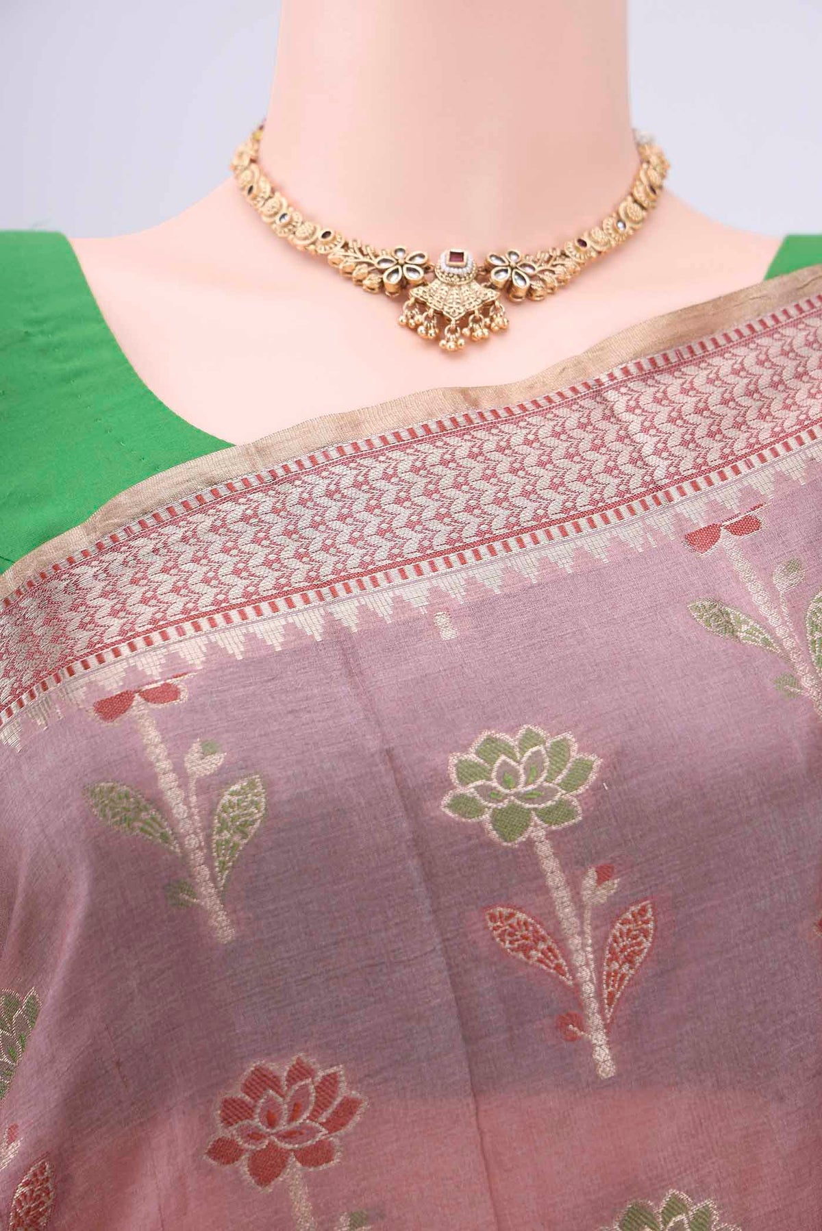Border image of Mauve Banarasi Raw Silk Saree with Zari Butta on the body and Zari And Thread Border