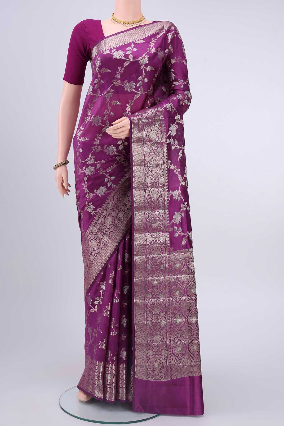 Violet Banarasi Raw Silk Saree with Zari Butta on the body and Zari Border displayed on a mannequin