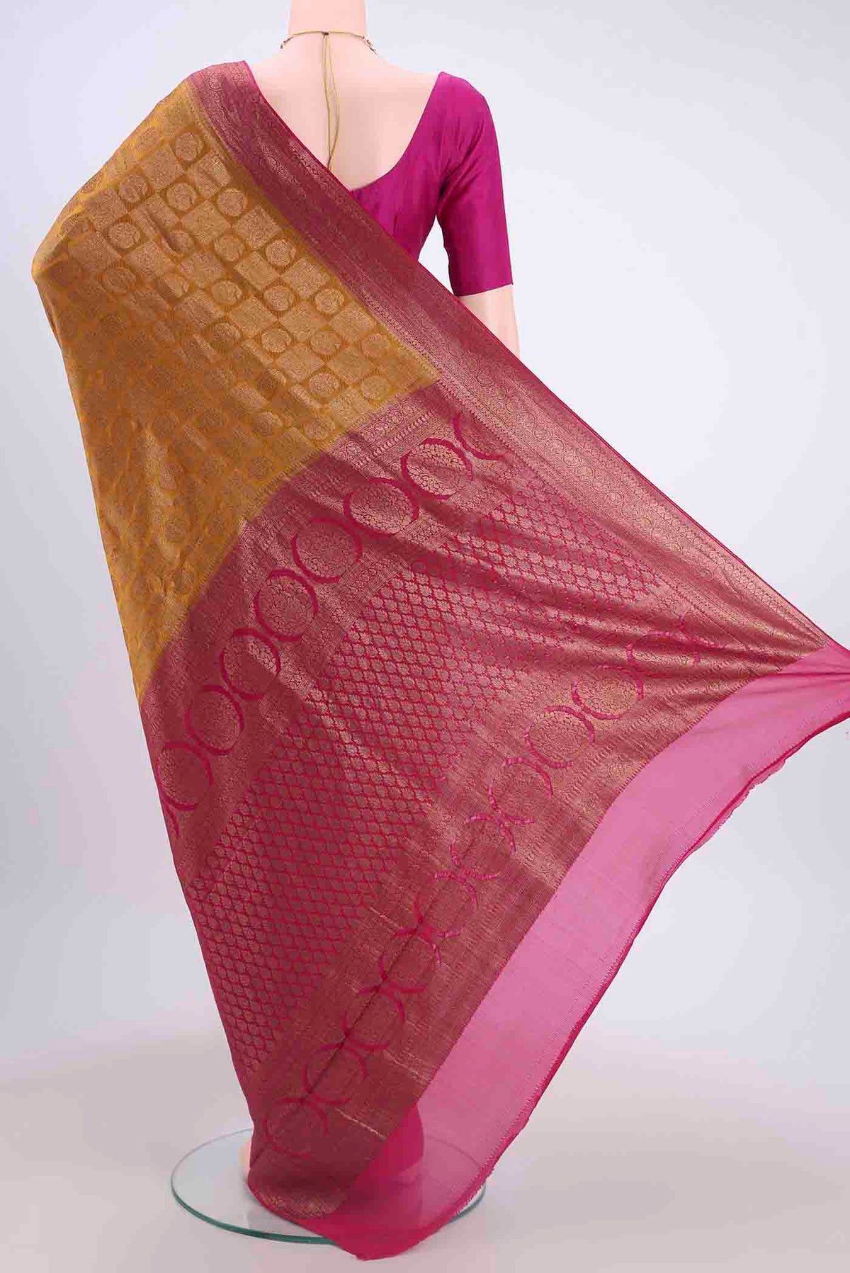 Flat view of Mustard Dual Tone Mysore Crepe Saree with Zari Brocade on the body and Zari Border