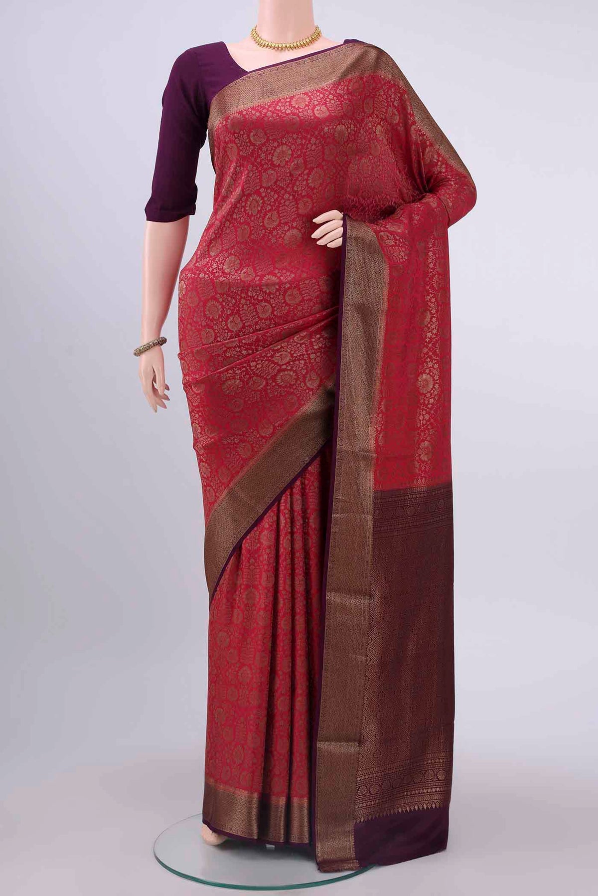 Maroon Mysore Crepe Saree with Zari Brocade on the body and Zari Border displayed on a mannequin