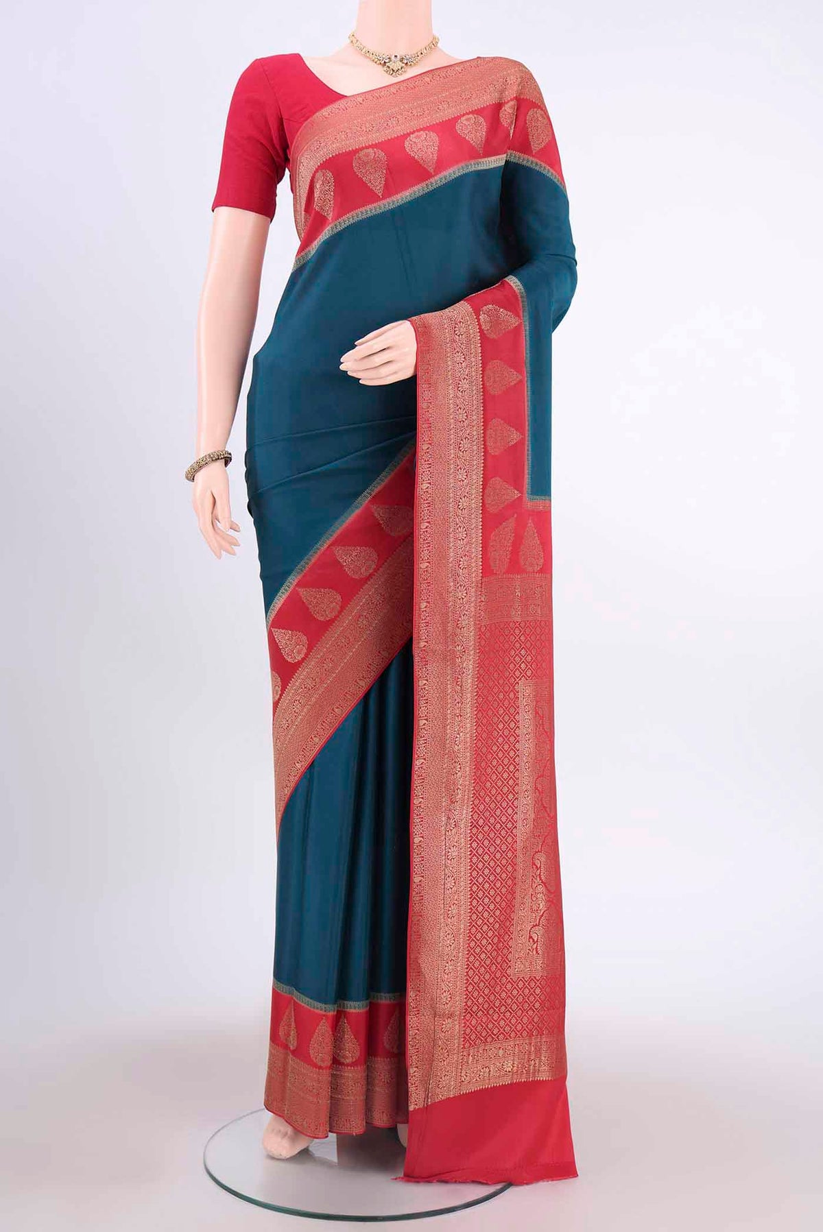 Dark Blue Mysore Crepe Saree with Plain Body and Zari Border displayed on a mannequin