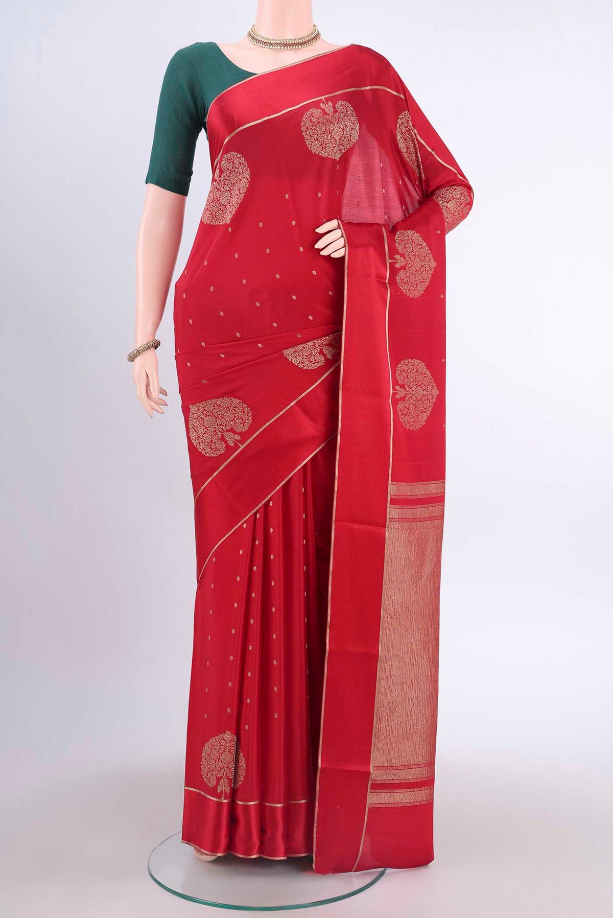 Red Mysore Crepe Saree with Zari Butta on the body and Thin Zari Line displayed on a mannequin
