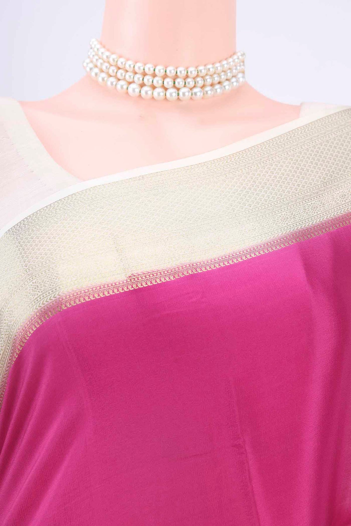 Border image of Light Magenta Mysore Crepe Saree with Plain Body and Zari Border