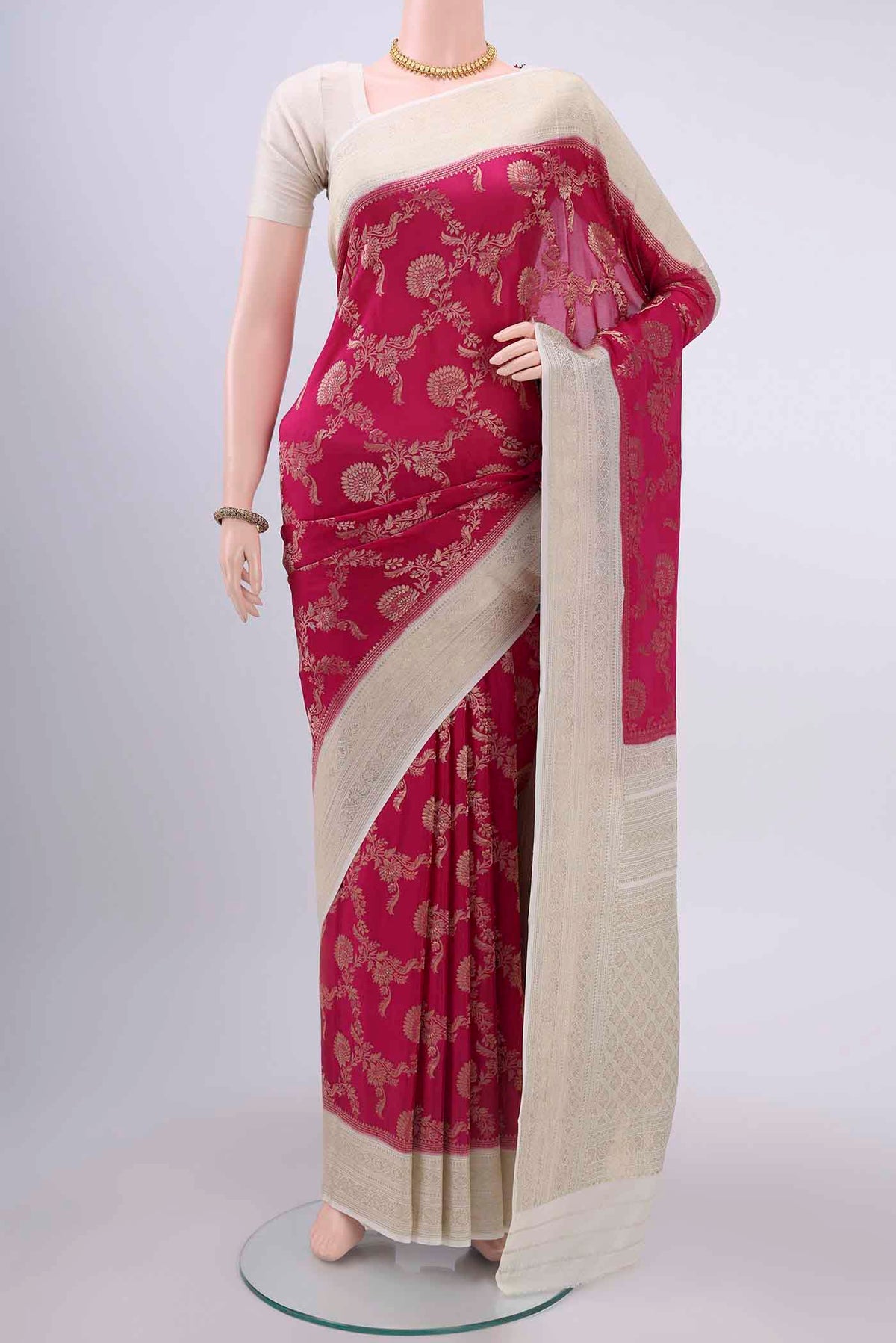 Rani Pink Mysore Crepe Saree with Zari Brocade on the body and Zari Border displayed on a mannequin