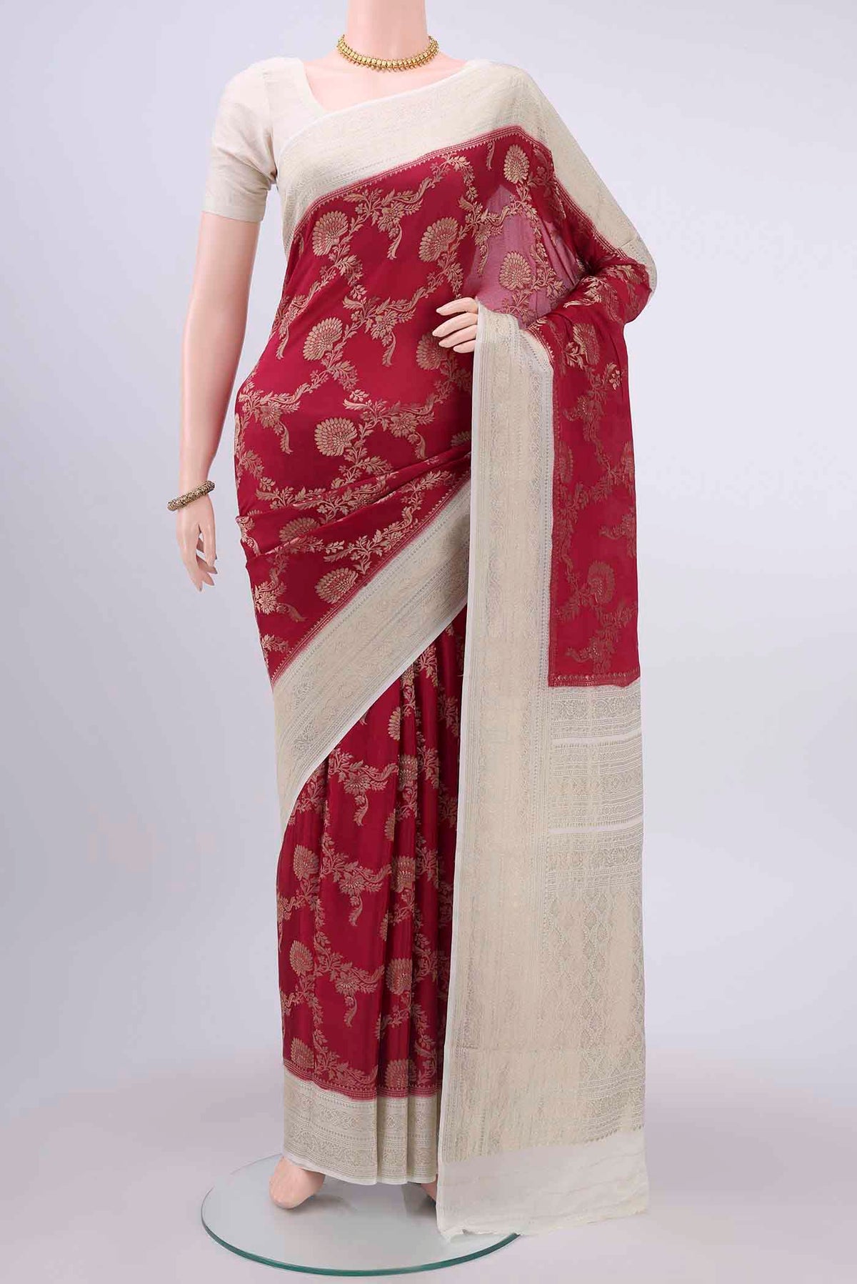 Maroon Mysore Crepe Saree with Zari Brocade on the body and Zari Border displayed on a mannequin