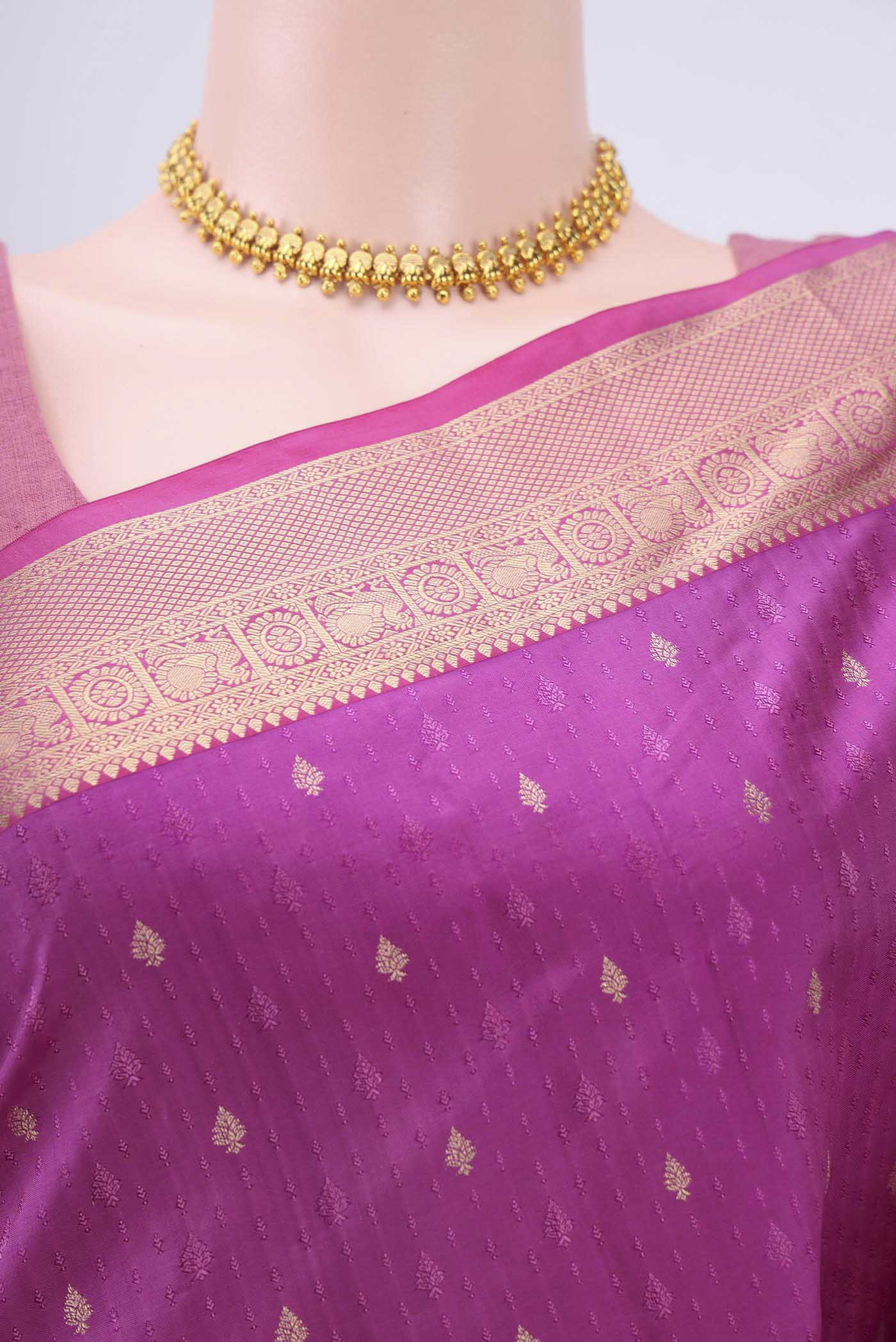 Border image of Magenta Soft Silk Saree with Jacquard With Zari Butta on the body and Zari Border