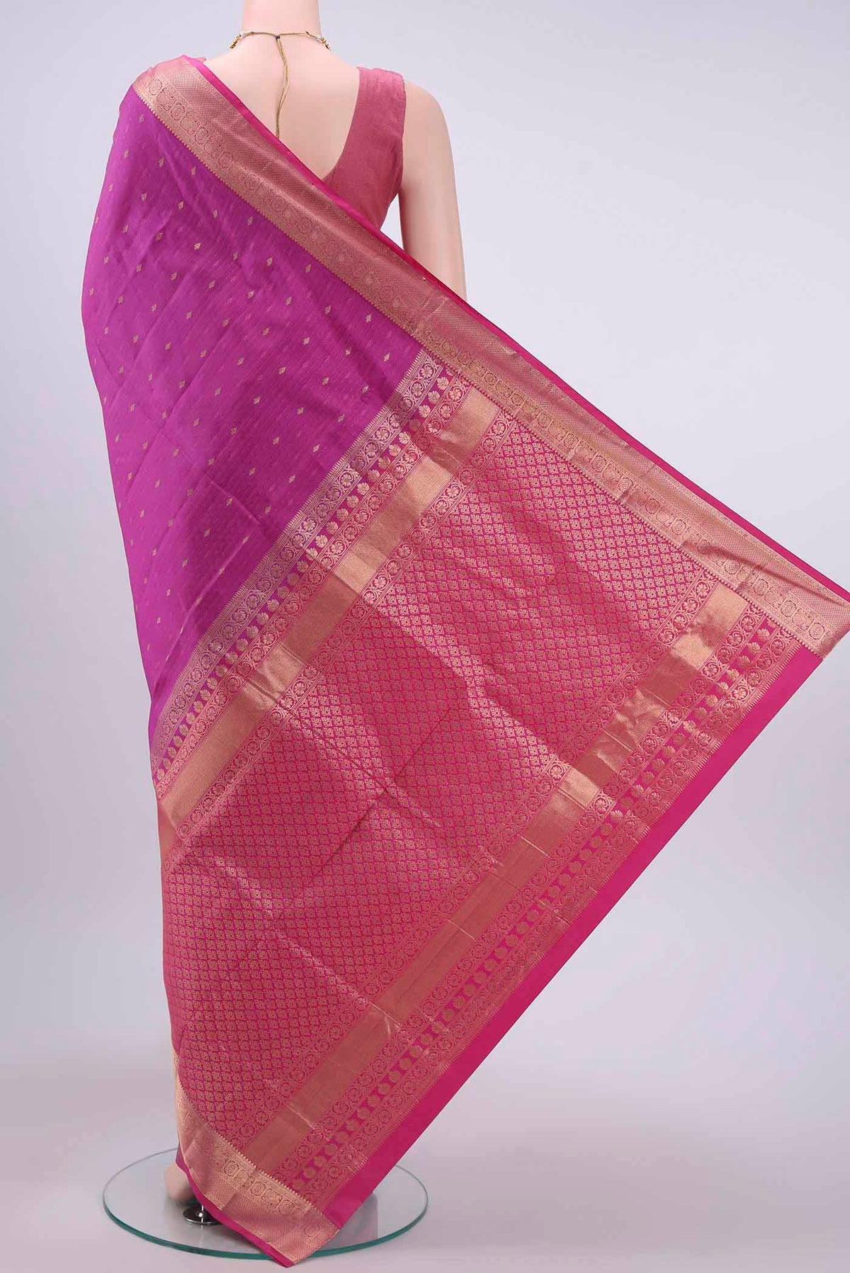 Flat view of Magenta Soft Silk Saree with Jacquard With Zari Butta on the body and Zari Border