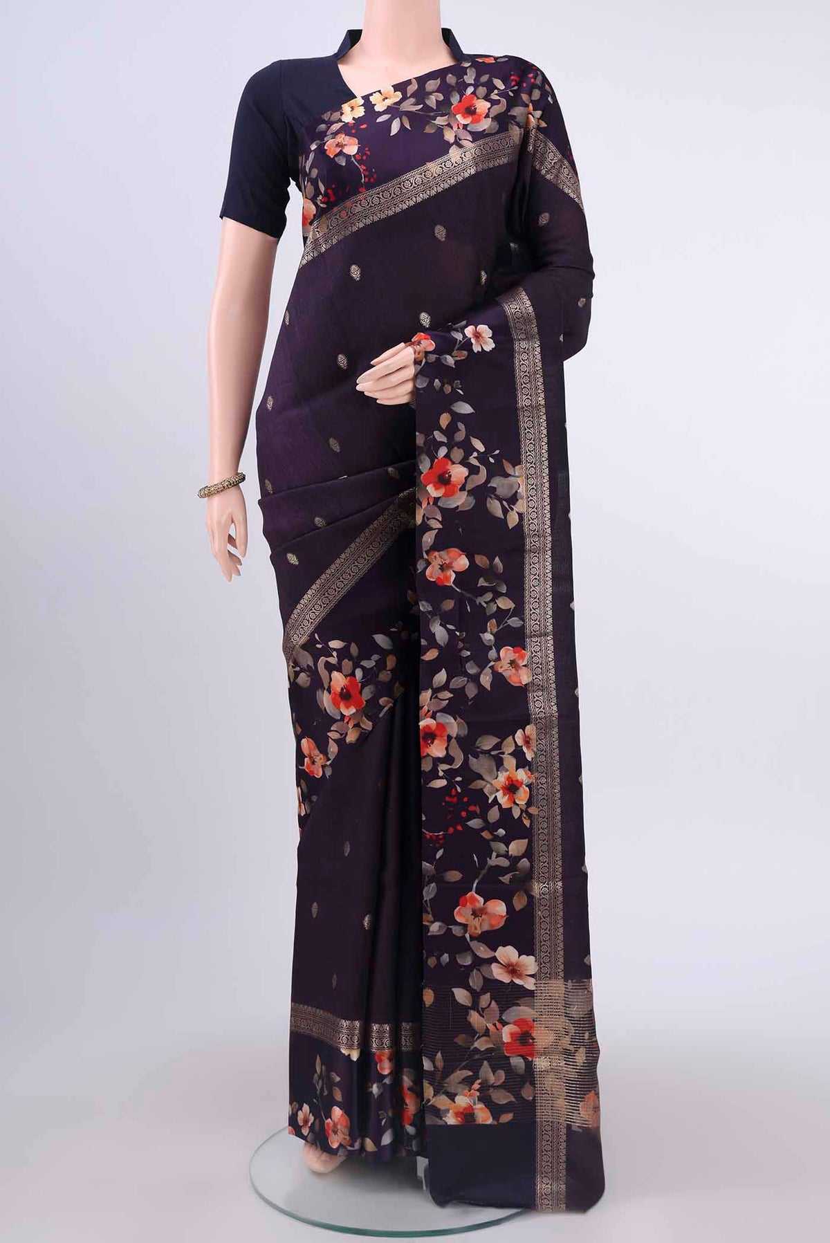 Brown Tussar Silk Saree with Zari Butta on the body and Satin Border displayed on a mannequin