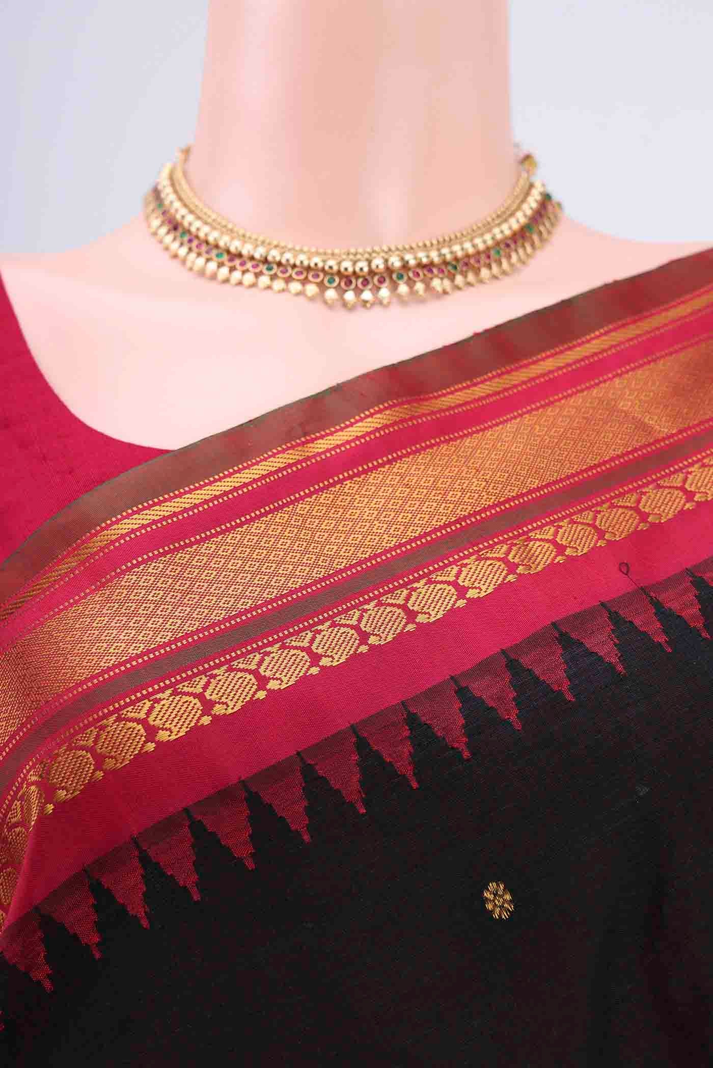 Border image of Black Gadwal Silk Saree with Zari Butta on the body and Zari Border