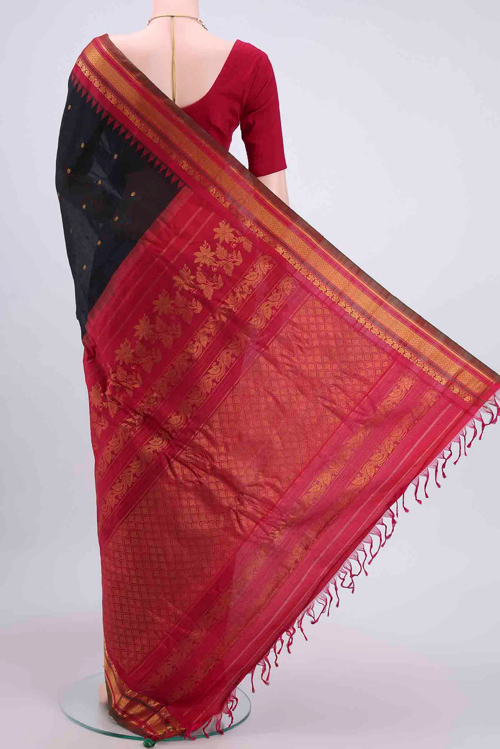 Flat view of Black Gadwal Silk Saree with Zari Butta on the body and Zari Border