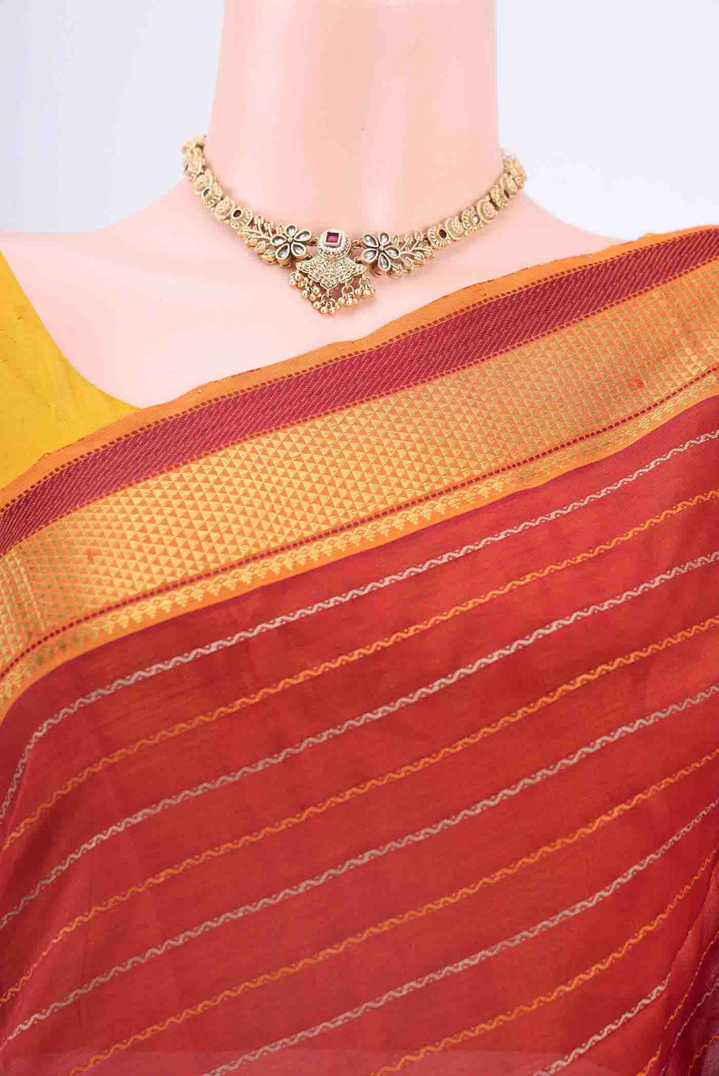 Border image of Maroon Silk Cotton Saree with Veldhari on the body and Zari Border