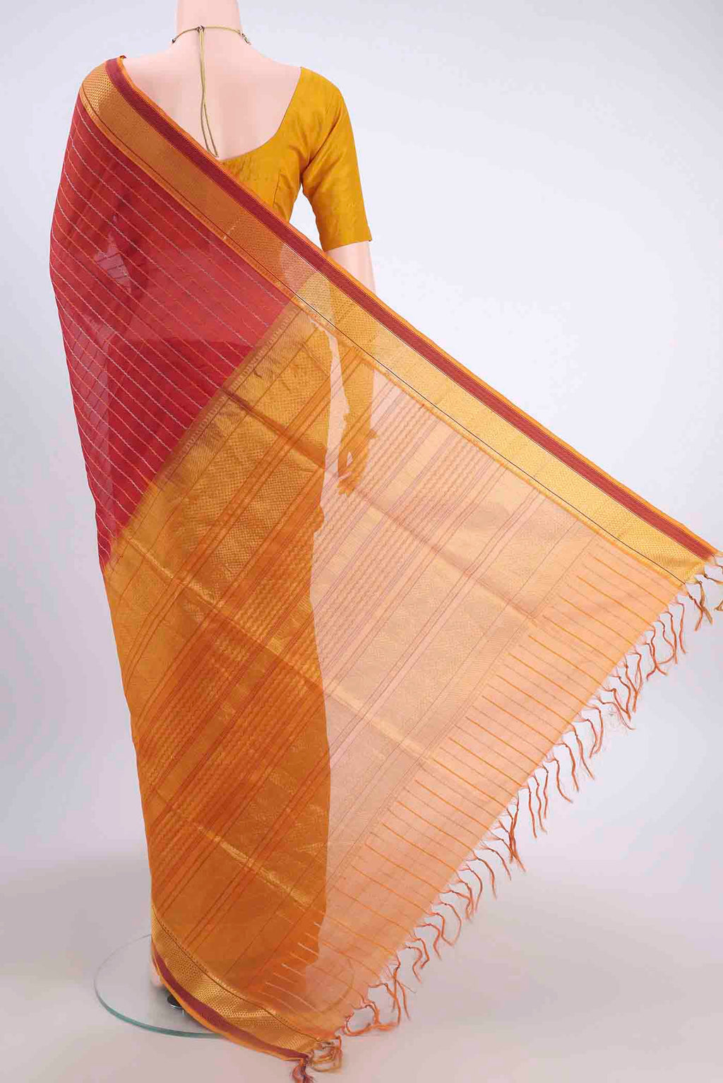 Flat view of Maroon Silk Cotton Saree with Veldhari on the body and Zari Border