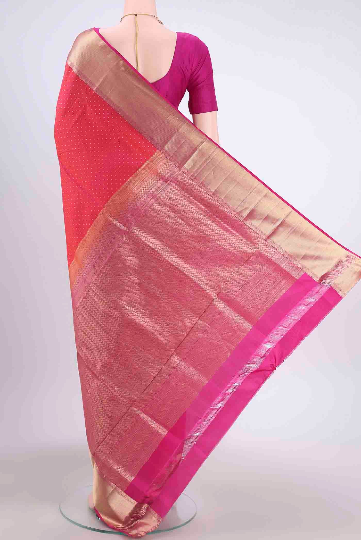 Flat view of Pure Silk Pure Zari Dark Pink Soft Saree with Zari Butta on the body and Zari Border