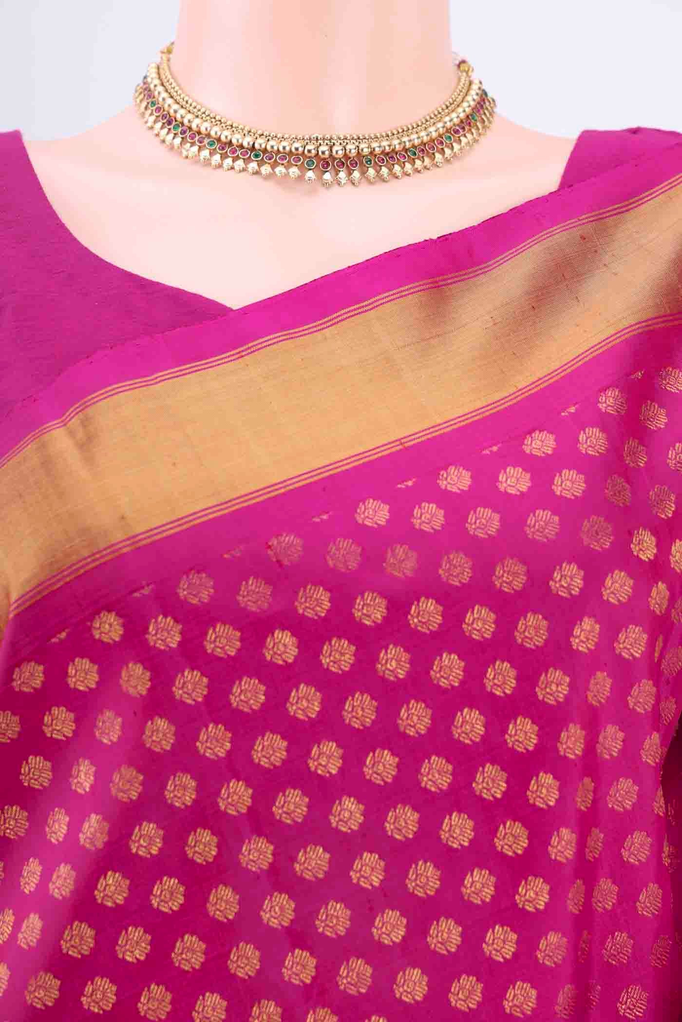 Border image of Pure Silk Pure Zari Maroon Kanchipuram Saree with Zari Butta on the body and Zari Border