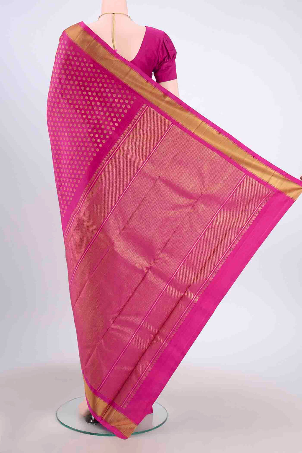 Flat view of Pure Silk Pure Zari Maroon Kanchipuram Saree with Zari Butta on the body and Zari Border