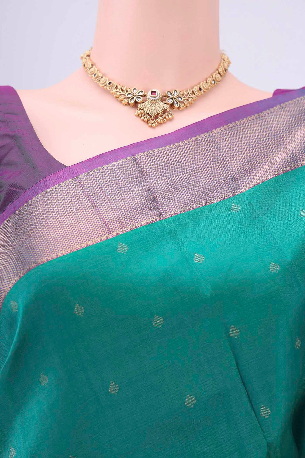 Border image of Green Kanchipuram Silk Saree with Zari Butta on the body and Zari Border