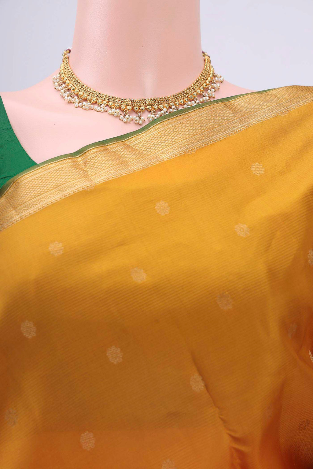 Border image of Mustard Nangavalli Silk [ Salem ] Saree with Zari Butta on the body and Zari Border