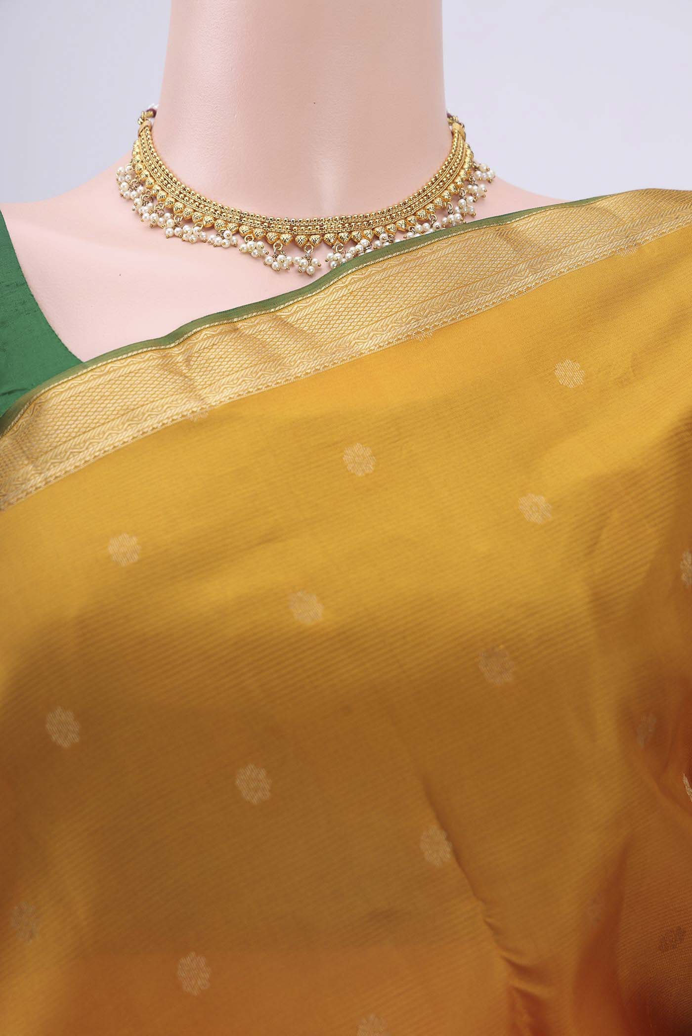 Border image of Mustard Nangavalli Silk [ Salem ] Saree with Zari Butta on the body and Zari Border