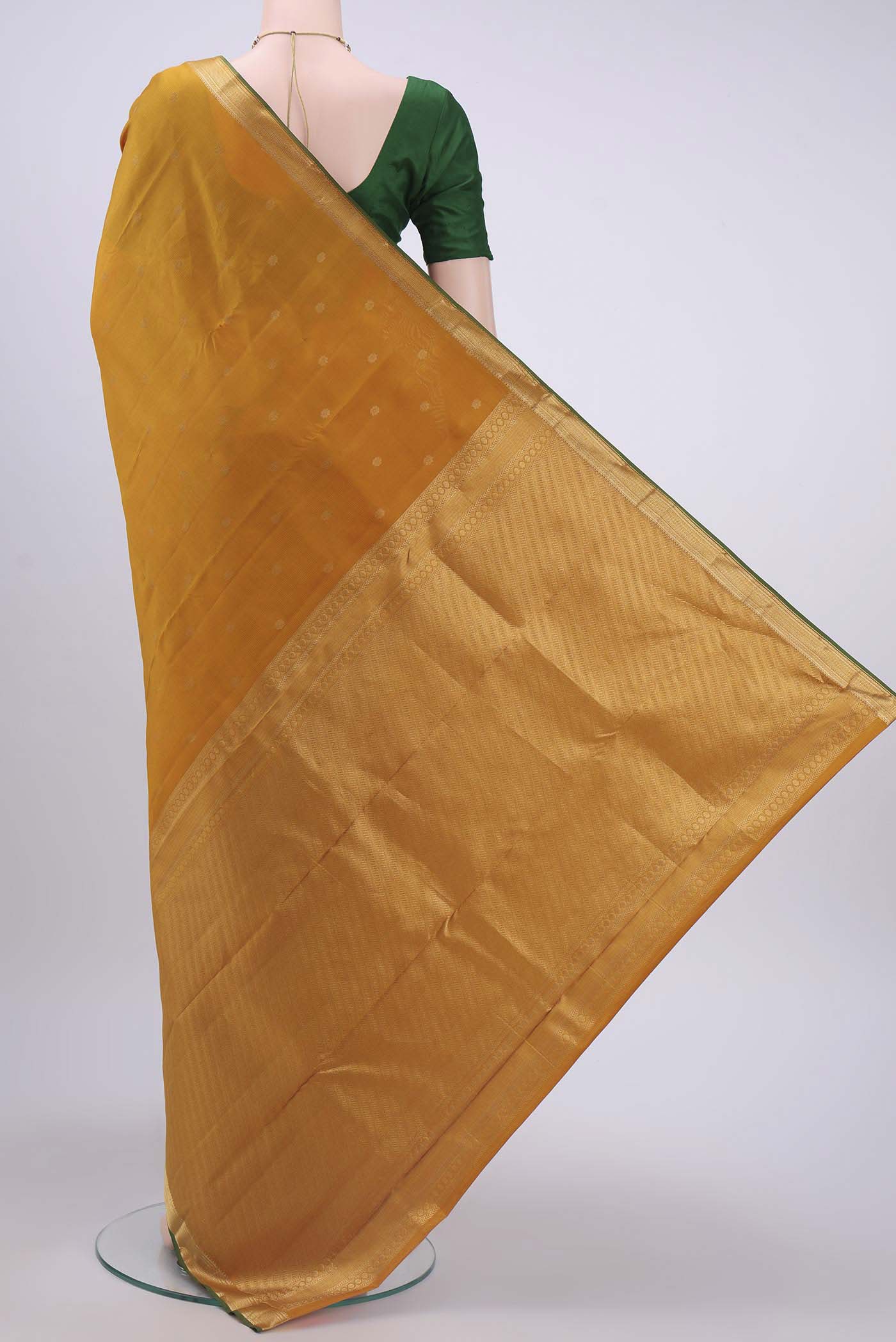Flat view of Mustard Nangavalli Silk [ Salem ] Saree with Zari Butta on the body and Zari Border