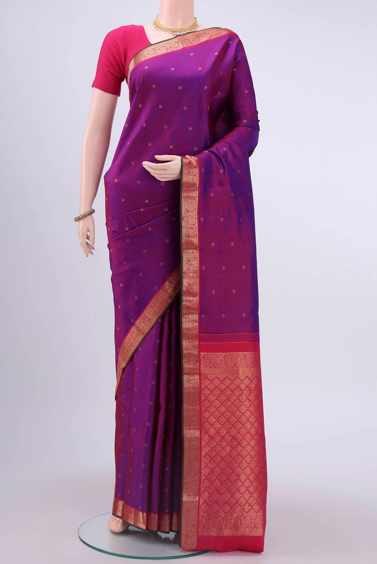 Purple Nangavalli Silk [ Salem ] Saree with Zari Butta on the body and Zari Border displayed on a mannequin