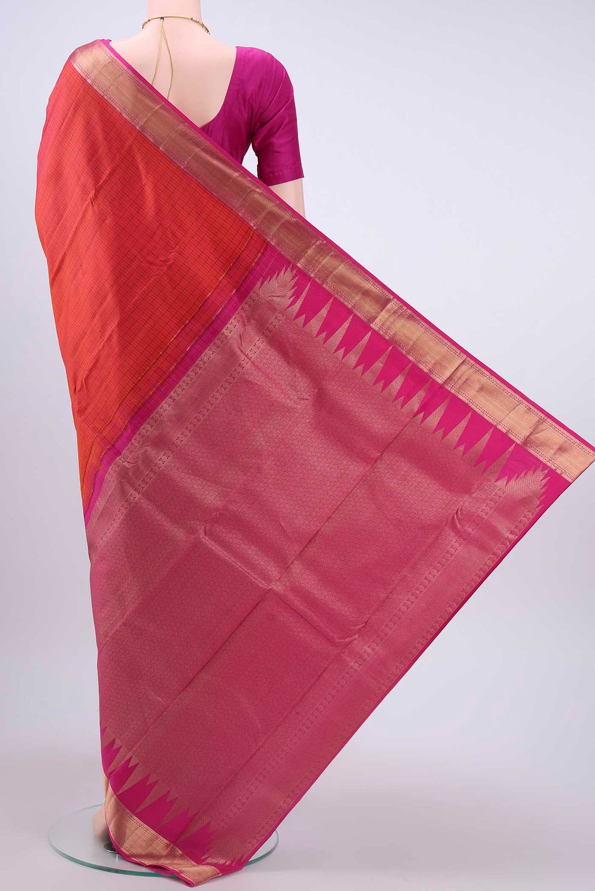 Flat view of Orange Kanchipuram Silk Saree with Checked design on the body and Zari Border