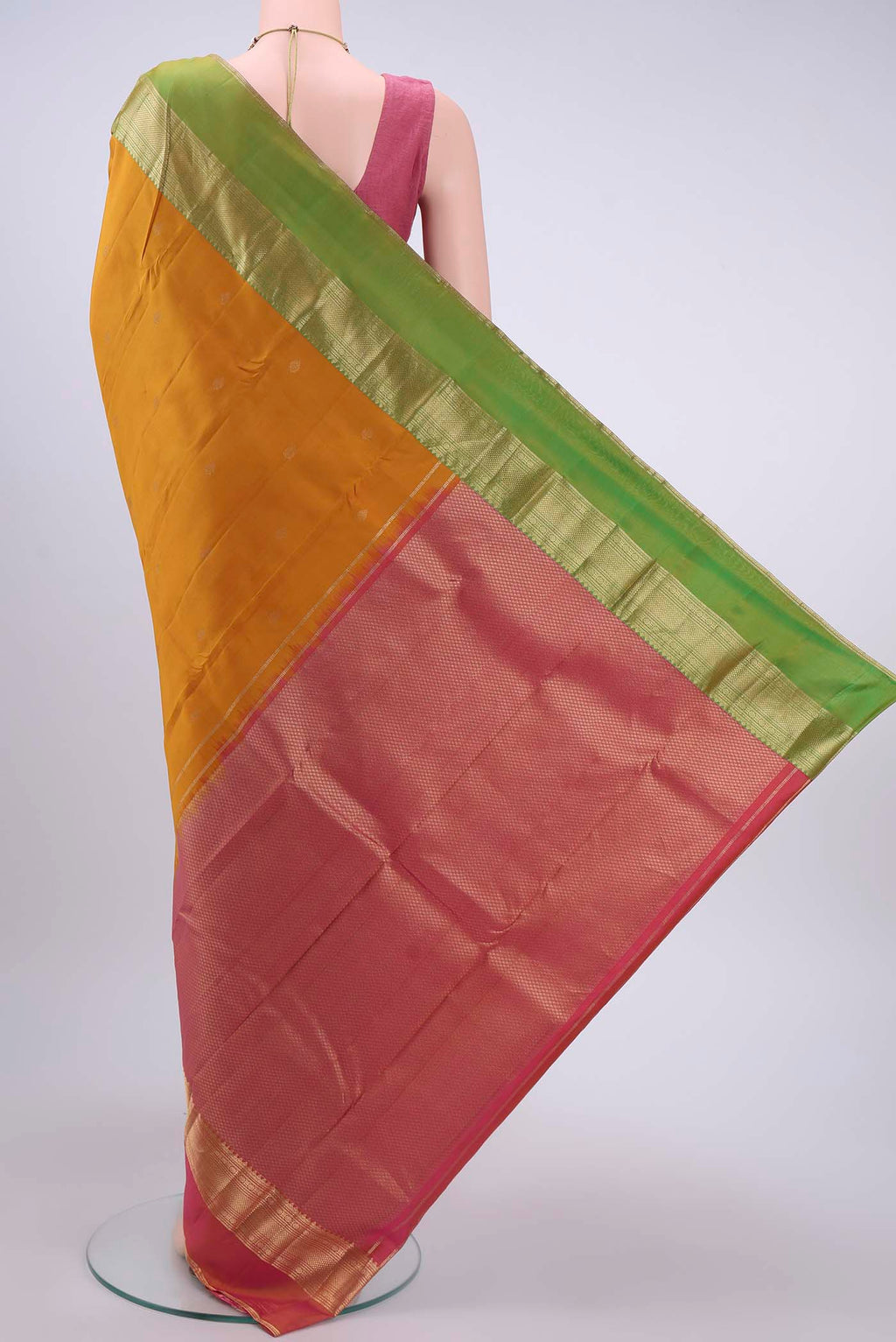Flat view of Mustard Nangavalli Silk [ Salem ] Saree with Zari Butta on the body and Ganga Jamuna Border