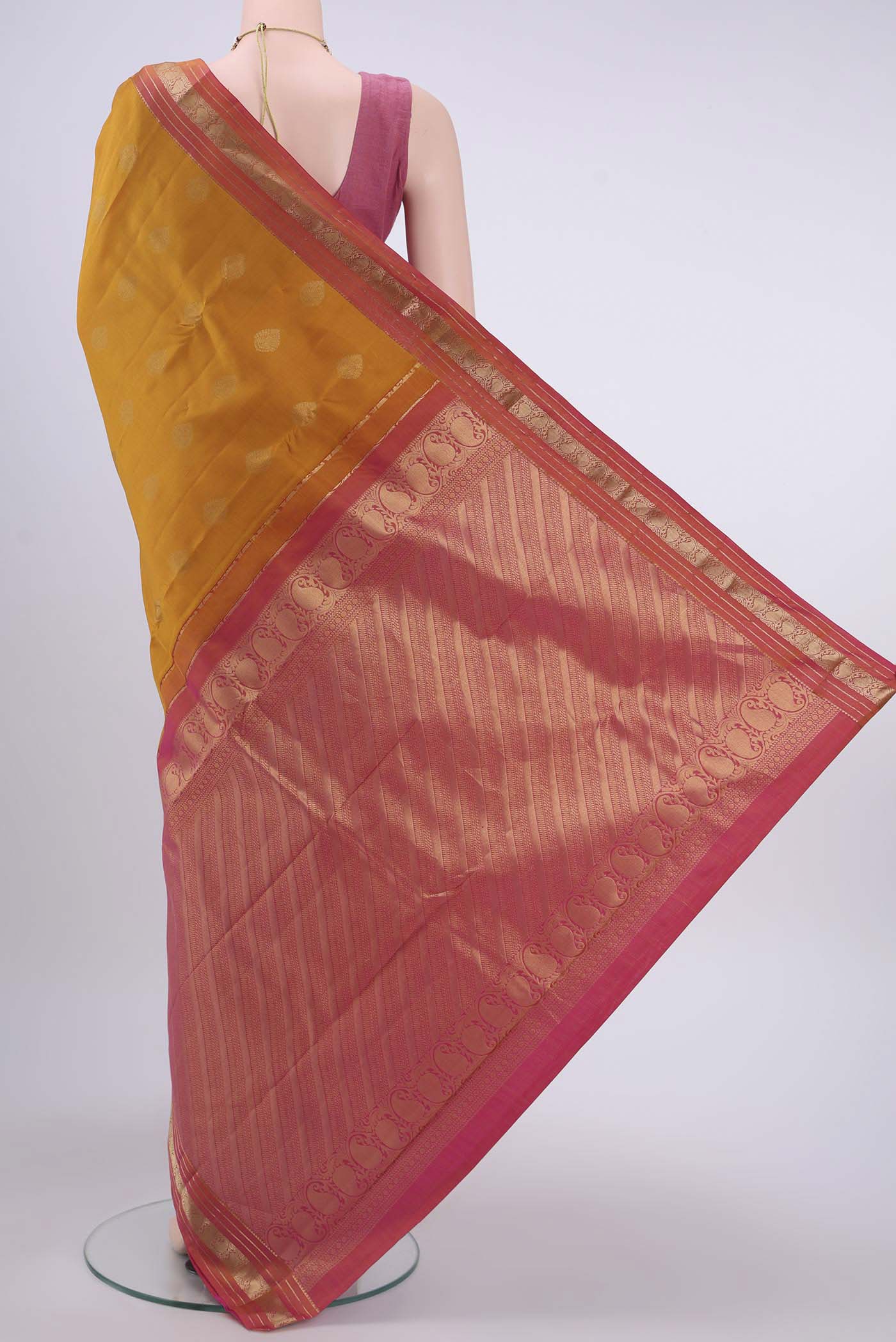 Flat view of Mustard Nangavalli Silk [ Salem ] Saree with Zari Butta on the body and Zari Border