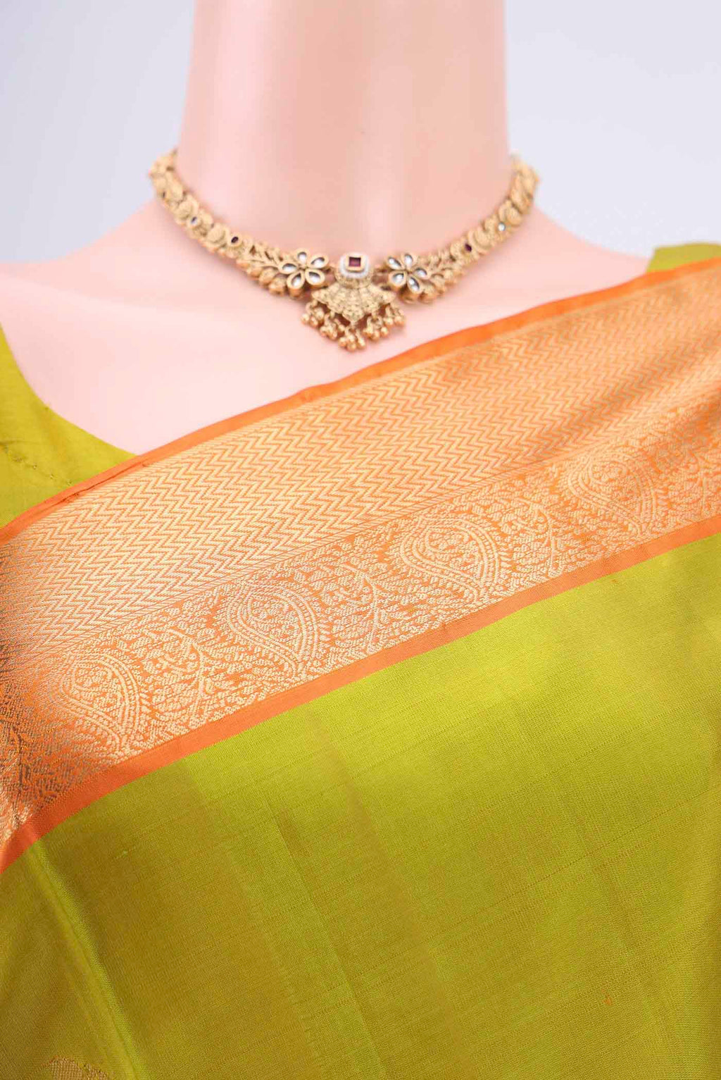 Border image of Light Green Soft Silk Saree with Zari Butta on the body and Zari Border. 