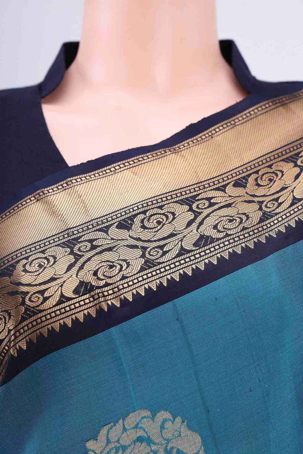 Border image of Blue Soft Silk Saree with Zari Butta on the body and Zari Border. 