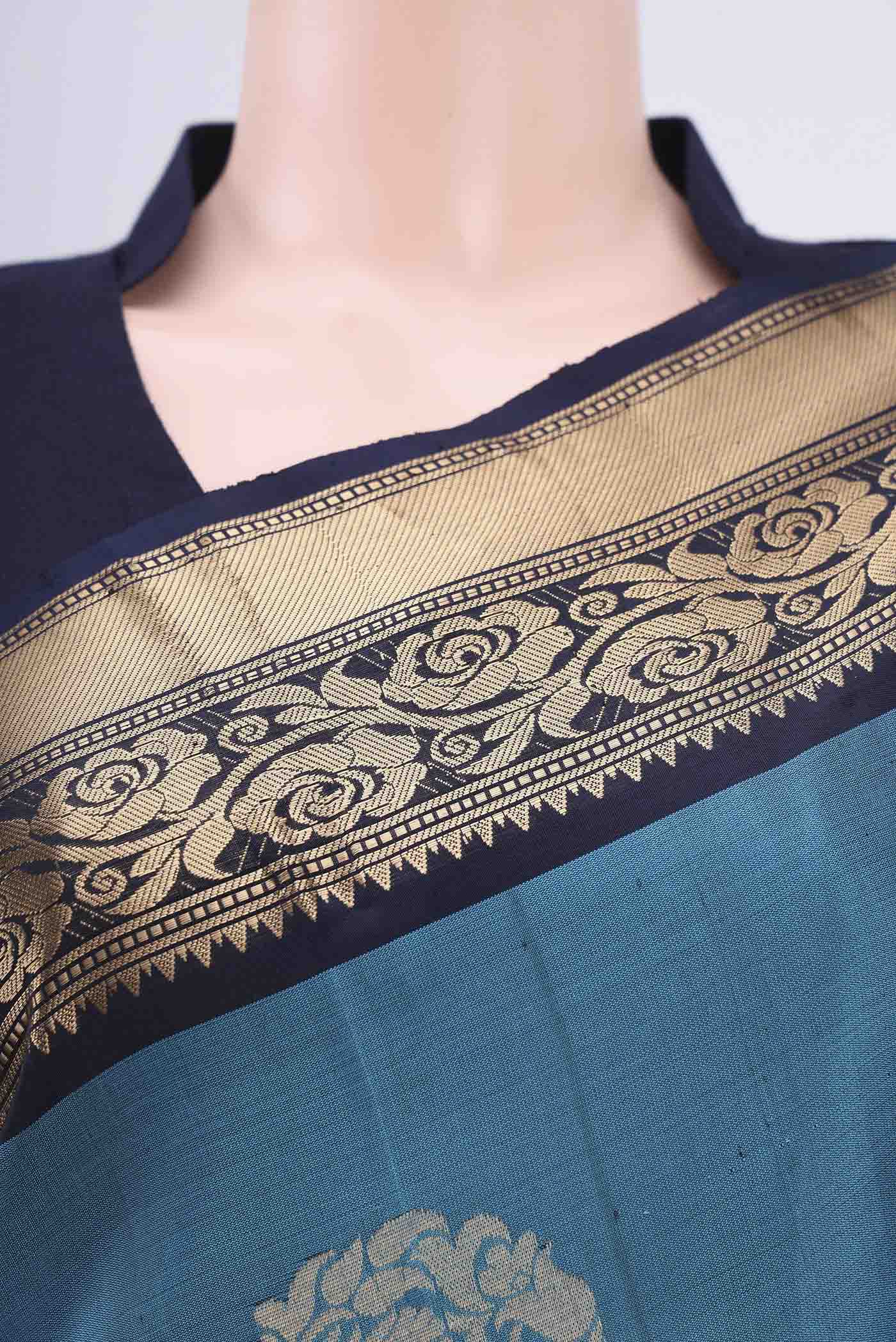 Border image of Blue Soft Silk Saree with Zari Butta on the body and Zari Border. 