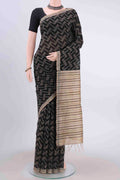 Black Tussar Silk Saree with Zig Zag design on the body and Plain Border displayed on a mannequin