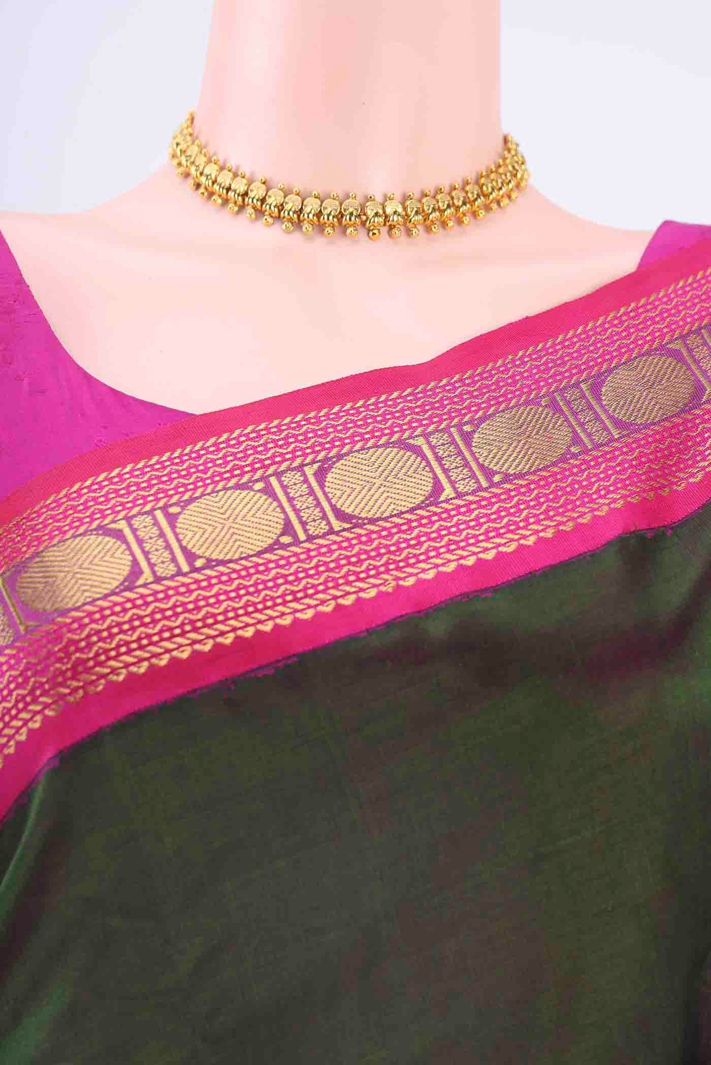 Border image of Bottle Green Blended Coimbatore Silk Cotton Saree with Plain Body and Zari Border