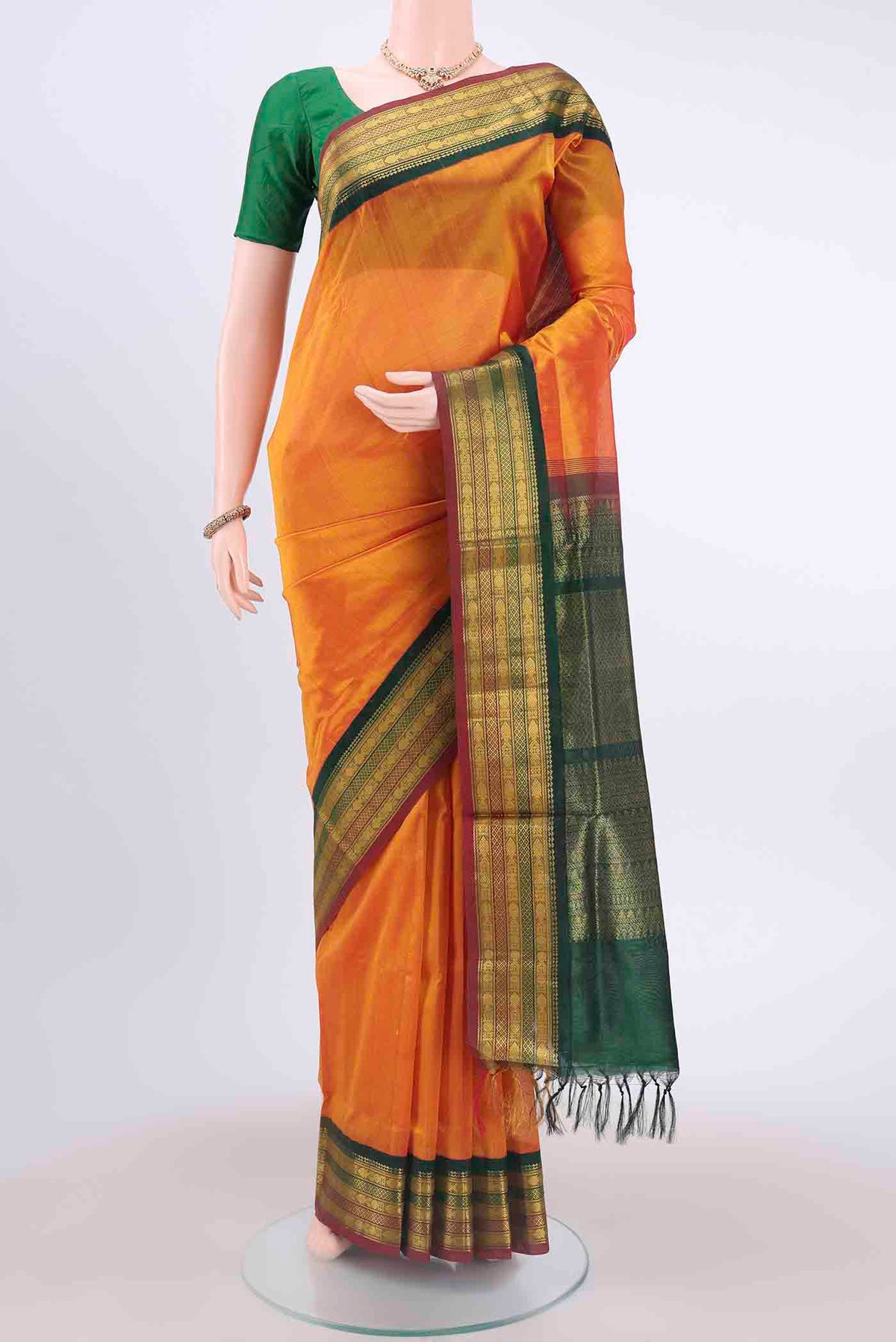 Yellow Blended Coimbatore Silk Cotton Saree with Plain Body and Zari Border displayed on a mannequin