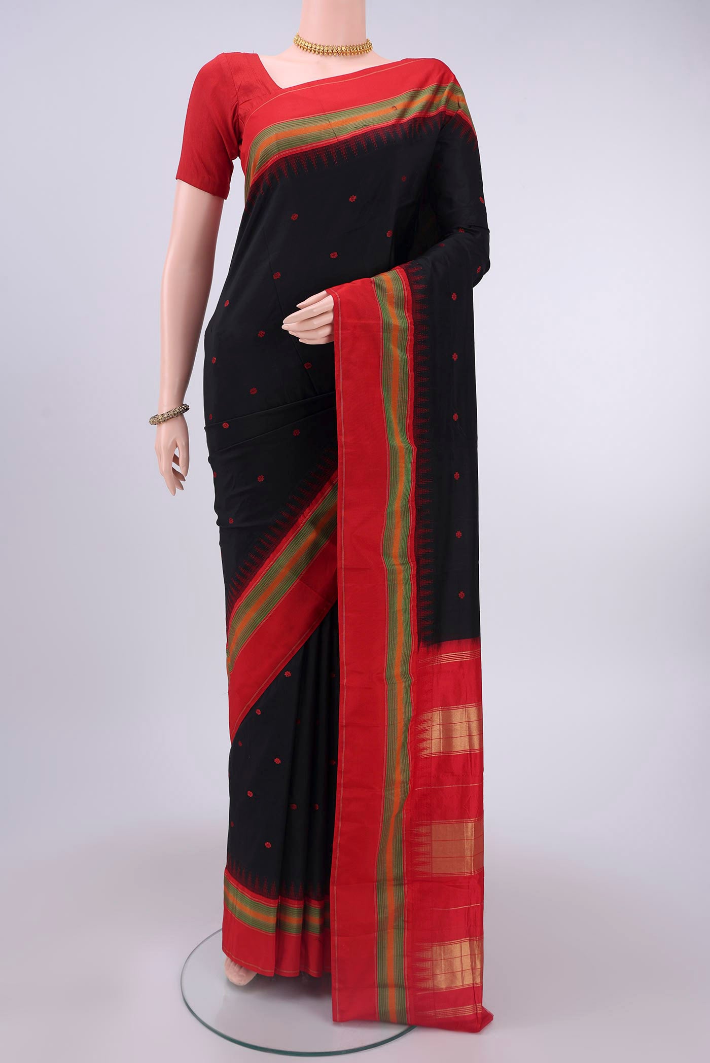 Black Bangalore Silk - kadyal Saree with Thread Butta on the body and Temple Border displayed on a mannequin
