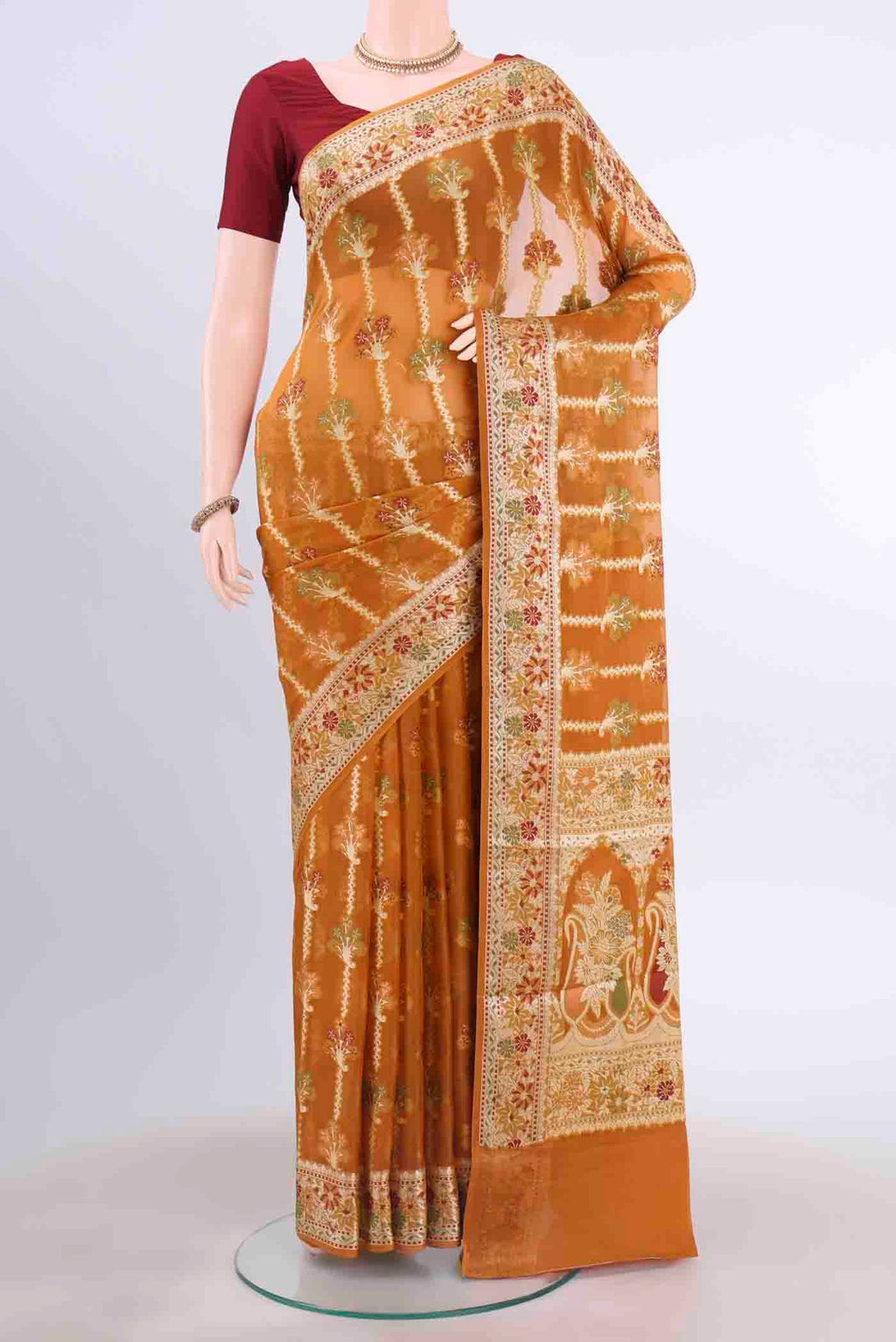 Brown Mysore Georgette Saree with Thread Brocade on the body and Thread Border displayed on a mannequin