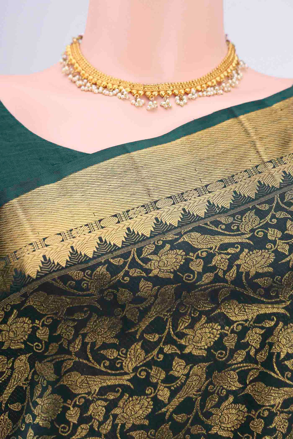 Border image of Bottle Green Kanchipuram Saree with Zari Brocade on the body and Zari Border