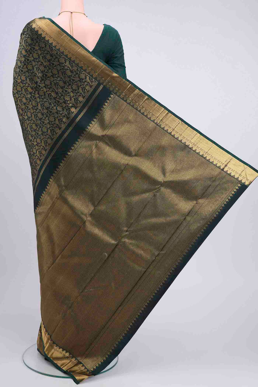 Flat view of Bottle Green Kanchipuram Saree with Zari Brocade on the body and Zari Border