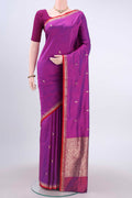 Magenta Dual Tone Banarasi Katan Silk Saree with Zari Butta on the body and Zari Border displayed on a mannequin