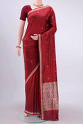 Maroon Dual Tone Banarasi Katan Silk Saree with Zari Butta on the body and Zari Border displayed on a mannequin