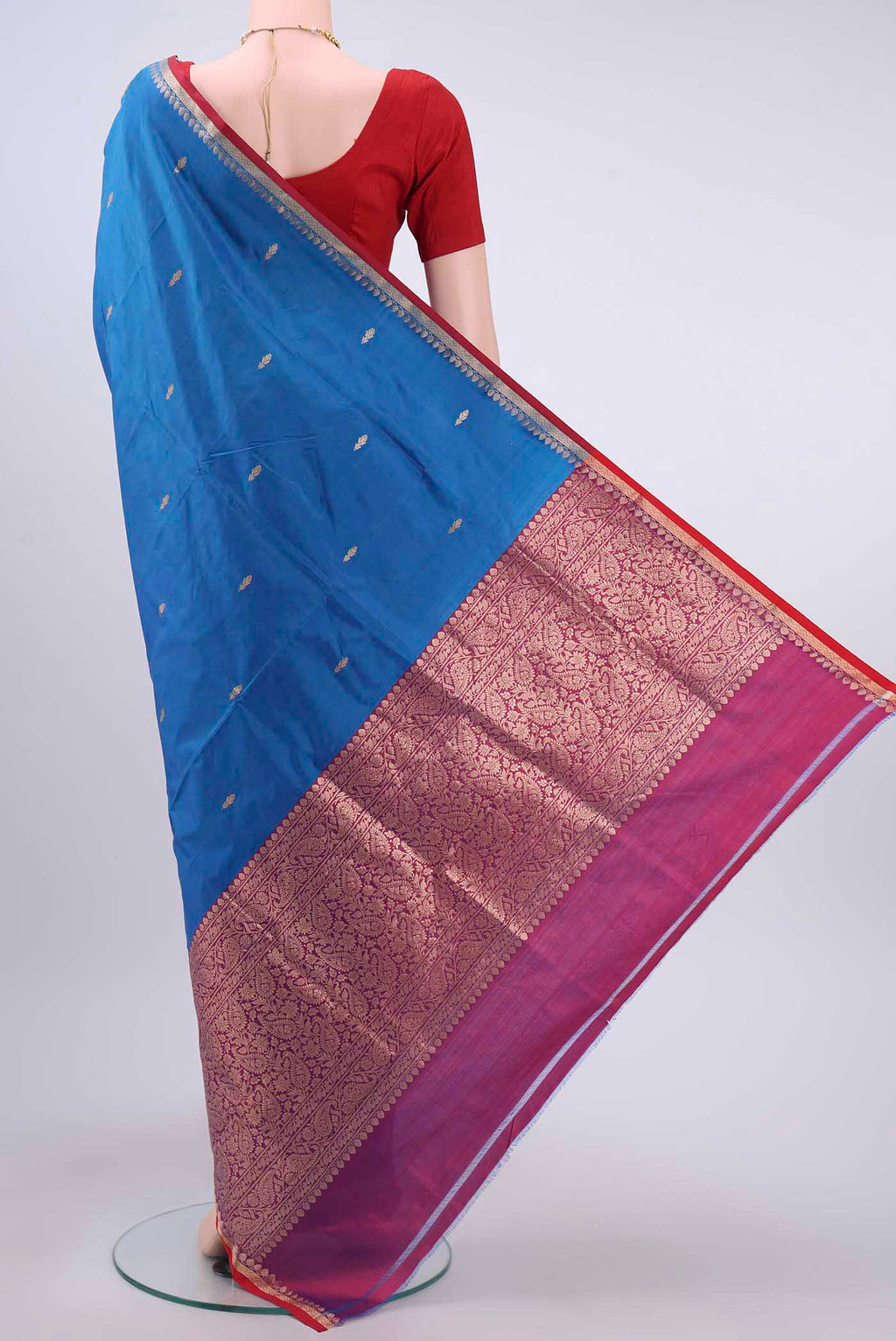 Flat view of Blue Dual Tone Banarasi Katan Silk Saree with Zari Butta on the body and Zari Border