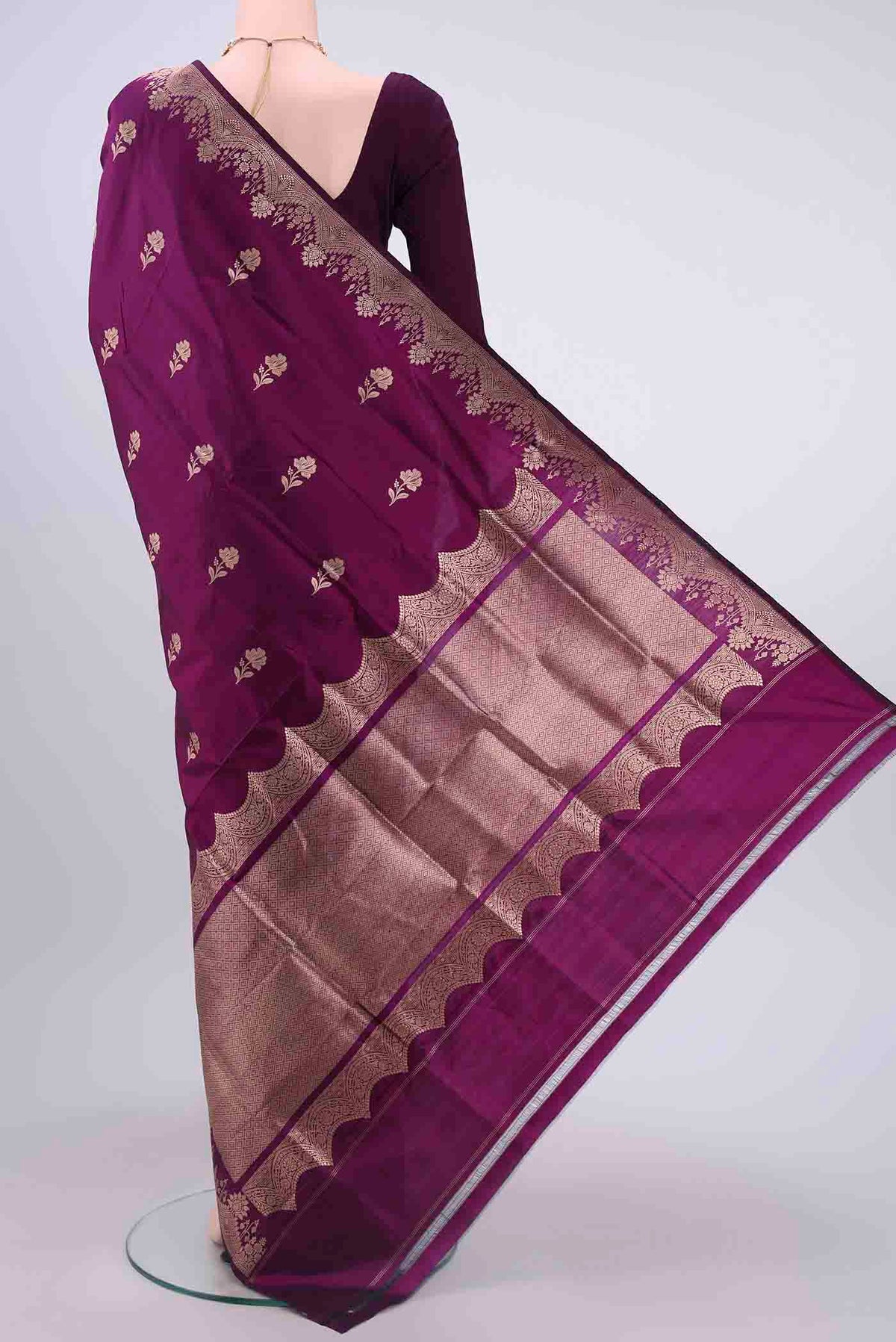 Flat view of Purple Banarasi Katan Silk Saree with Zari Butta on the body and Zari Border